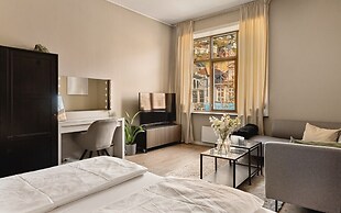 Fløyen Suites - Private Rooms I Location