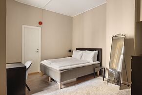 Fløyen Suites - Private Rooms I Location