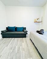 Affordable 4BR Apt Walk to FAC Platz