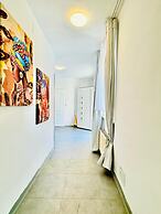 Affordable 4BR Apt Walk to FAC Platz