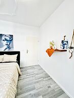 Affordable 4BR Apt Walk to FAC Platz
