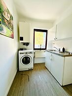 Affordable 4BR Apt Walk to FAC Platz