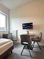 Longhouse Aparthotel