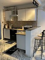 Cozy 1BR Retreat, Steps to Sand
