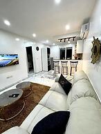 Cozy 1BR Retreat, Steps to Sand