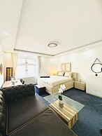 Spacious 7BR Apartment Prime Location