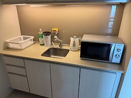 Swiss Garden Residences by Roomy