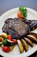Whispering Woods Cabins & Grill