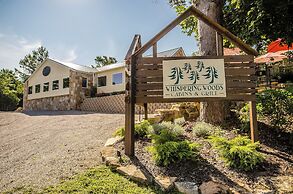 Whispering Woods Cabins & Grill