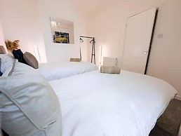 Central 3BR Home with Hot Tub Sleeps 10