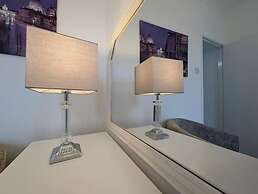 Central 3BR Home with Hot Tub Sleeps 10