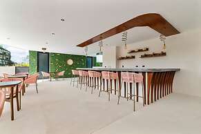 Guest INN Home - Elements Suites