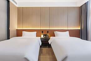 Wanzai Yijia La Maison Hotel