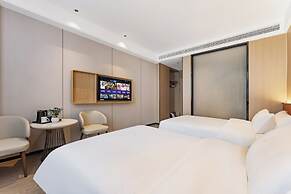 Wanzai Yijia La Maison Hotel