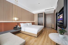 Wanzai Yijia La Maison Hotel