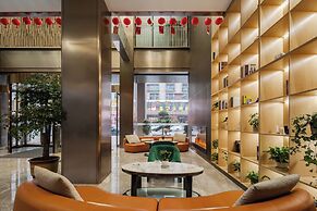 Wanzai Yijia La Maison Hotel