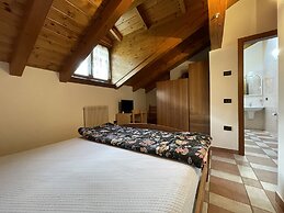 032 Luminosa Mansarda Pinzolo