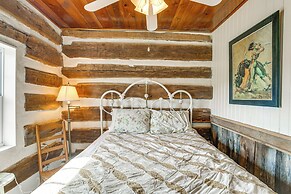 Hot Tub & Creek Views: Secluded Perryville Cabin