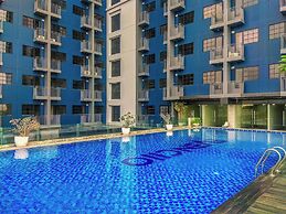 Comfy and Minimalist Studio with City View at Evenciio Margonda Apartm