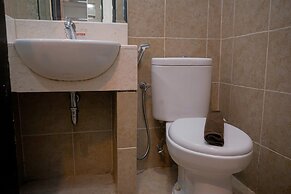 Warm and Minimalist Studio (No Kitchen) at Great Western Apartment