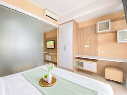 Homey and Comfortable 1BR Apartment at Dago Suites