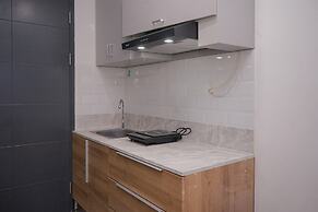 Warm and Spacious Studio Room at Collins Boulevard Apartment