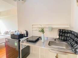 Cozy and Tranquil Studio at Podomoro Golf View Apartment