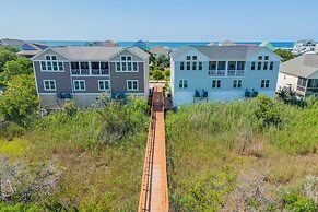 Walk to Beach: Oak Island Retreat w/ 210-yard Dock