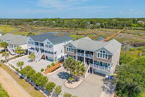 Walk to Beach: Oak Island Retreat w/ 210-yard Dock