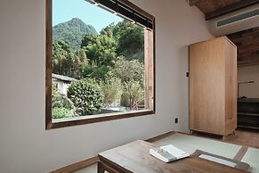 Emeishan Hetang Yunqi Tangquan Homestay