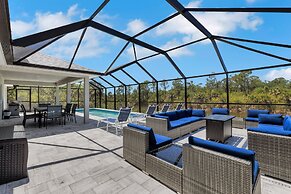 Poolside Sunset in South Gulf Cove 4 Bedroom Home