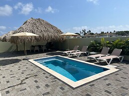 Villa Paradise with pool at mambo beach