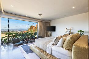 Stylish Hillside Retreat with Pool & Views