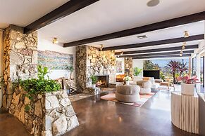 Stylish Hillside Retreat with Pool & Views
