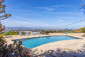 Stylish Hillside Retreat with Pool & Views