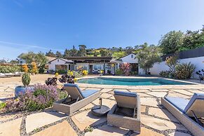 Stylish Hillside Retreat with Pool & Views