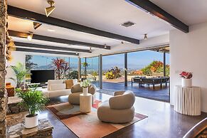 Stylish Hillside Retreat with Pool & Views