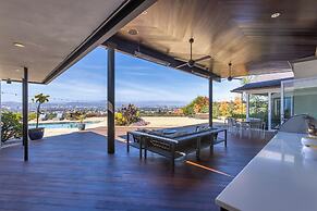 Stylish Hillside Retreat with Pool & Views