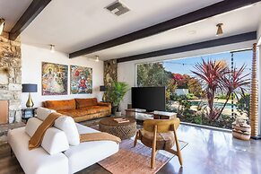 Stylish Hillside Retreat with Pool & Views