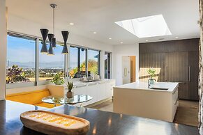 Stylish Hillside Retreat with Pool & Views