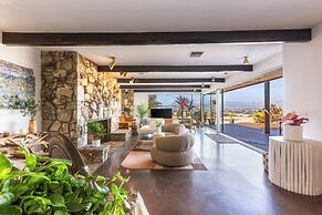 Stylish Hillside Retreat with Pool & Views