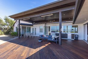 Stylish Hillside Retreat with Pool & Views