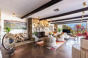 Stylish Hillside Retreat with Pool & Views