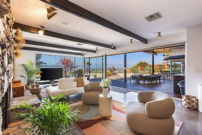 Stylish Hillside Retreat with Pool & Views
