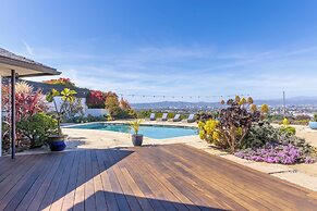 Stylish Hillside Retreat with Pool & Views