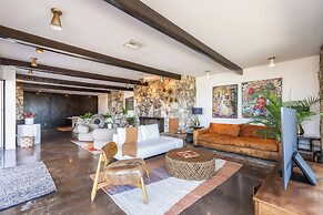 Stylish Hillside Retreat with Pool & Views