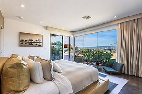 Stylish Hillside Retreat with Pool & Views