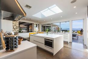Stylish Hillside Retreat with Pool & Views