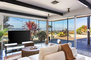 Stylish Hillside Retreat with Pool & Views