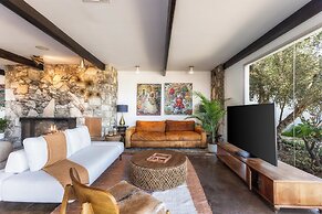 Stylish Hillside Retreat with Pool & Views